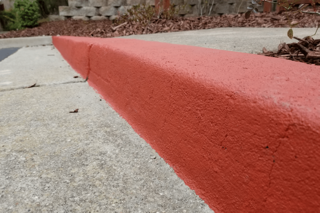 red concrete parking curb